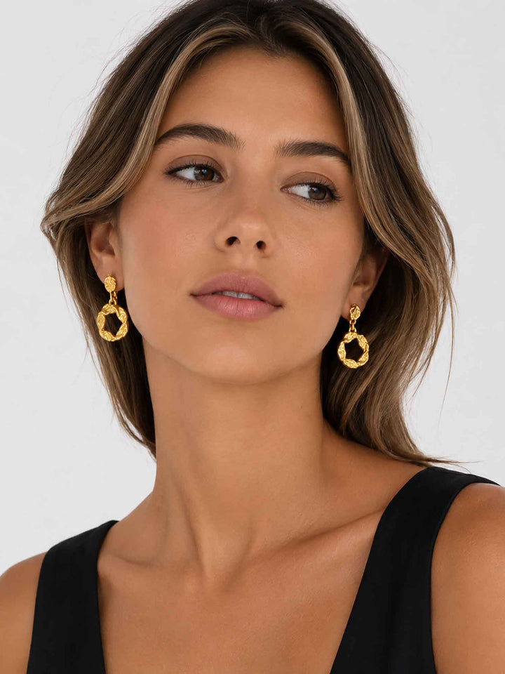 twisted-gold-hoop-drop-earrings-model-front
