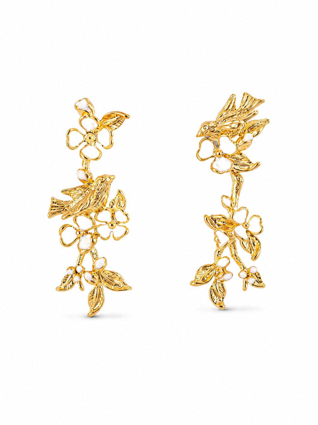 Pair of white floral bird gold drop earrings on white background